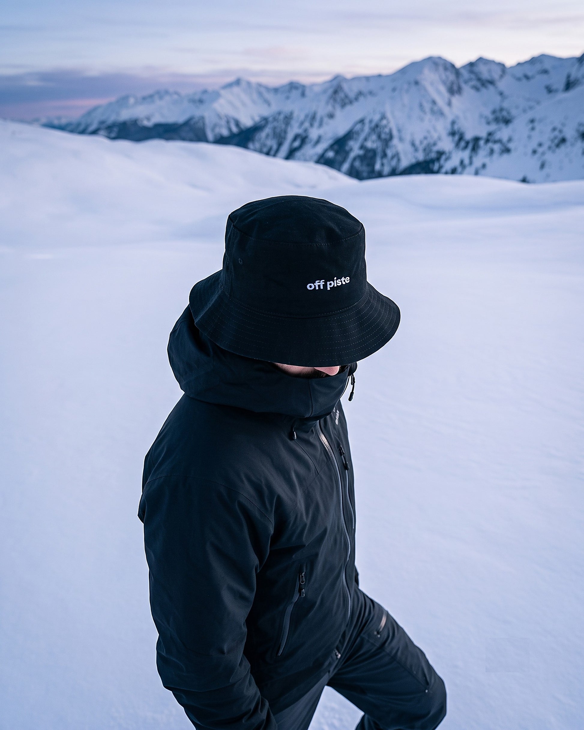 Off Piste Ski Bucket Hat – Cotton Sun Hat in Black, story view — Off Piste Alpine Tech collection