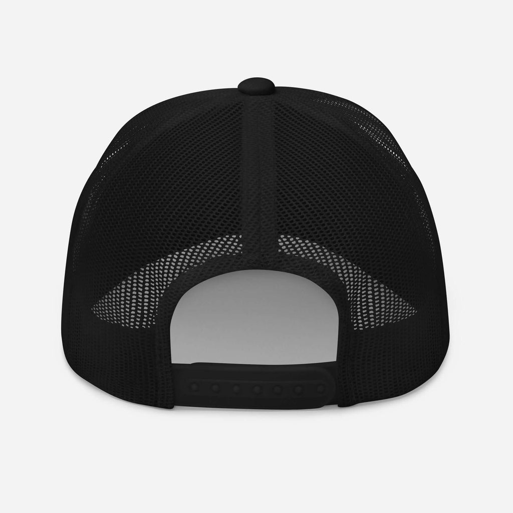Back view of a black trucker cap showcasing mesh design for breathability and adjustable snap closure.