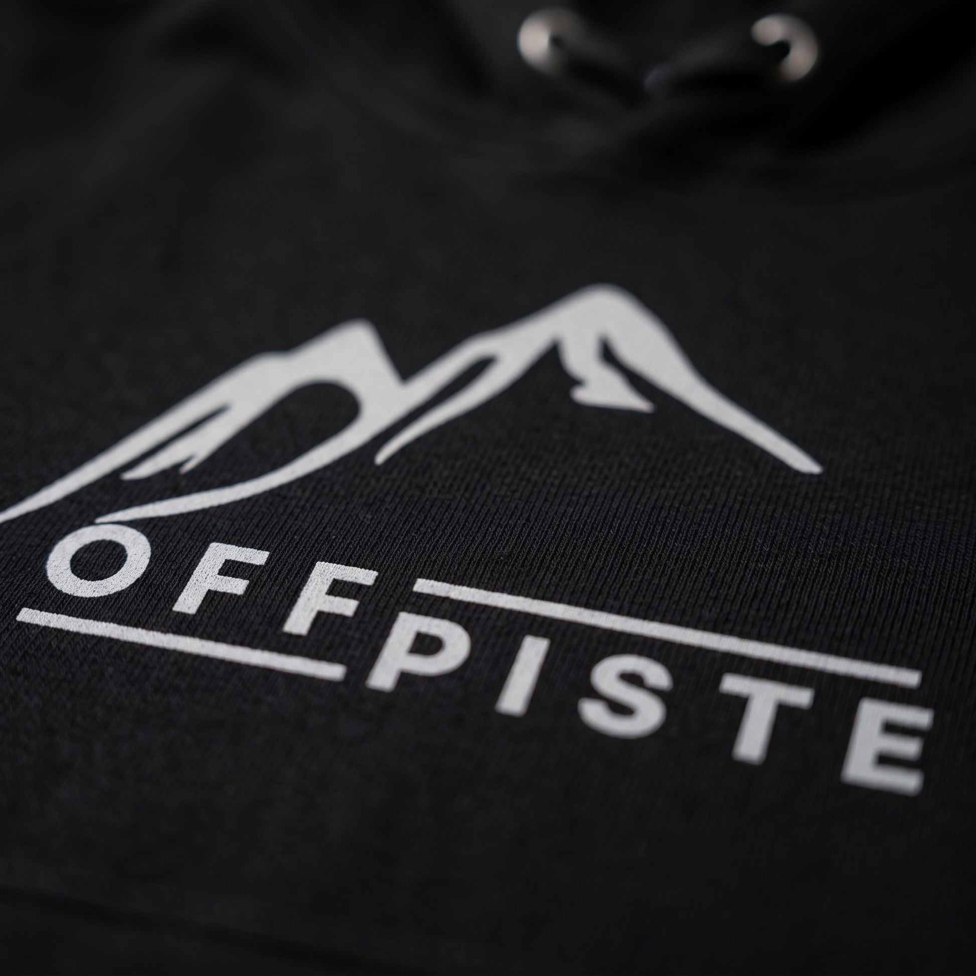 Off Piste Logo Ski Hoodie in Black, detail view — Off Piste Alpine Tech collection